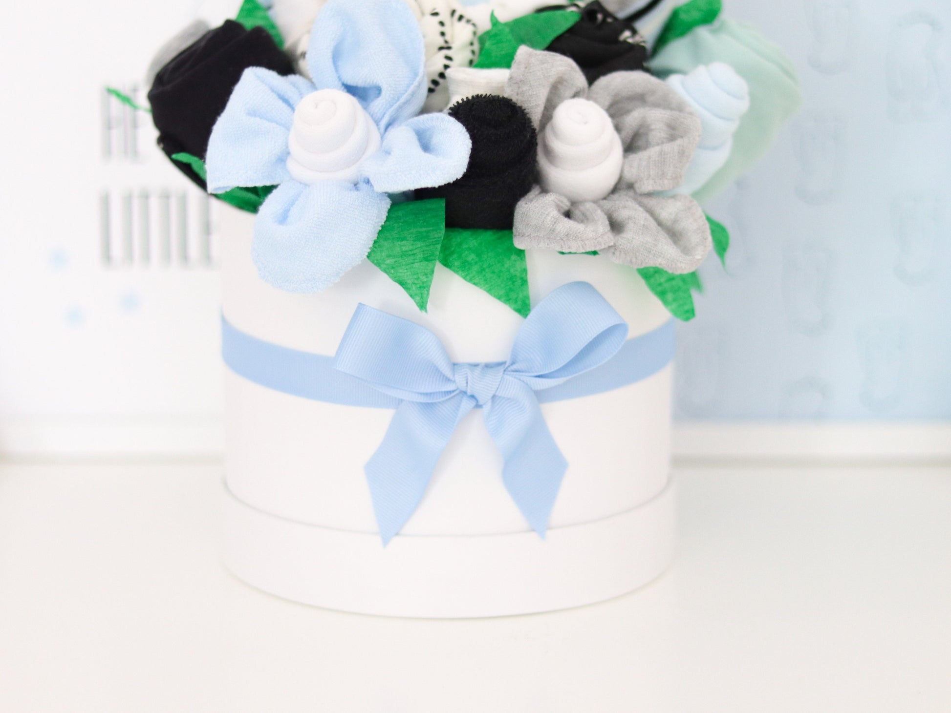 baby boy gift box with blue bow