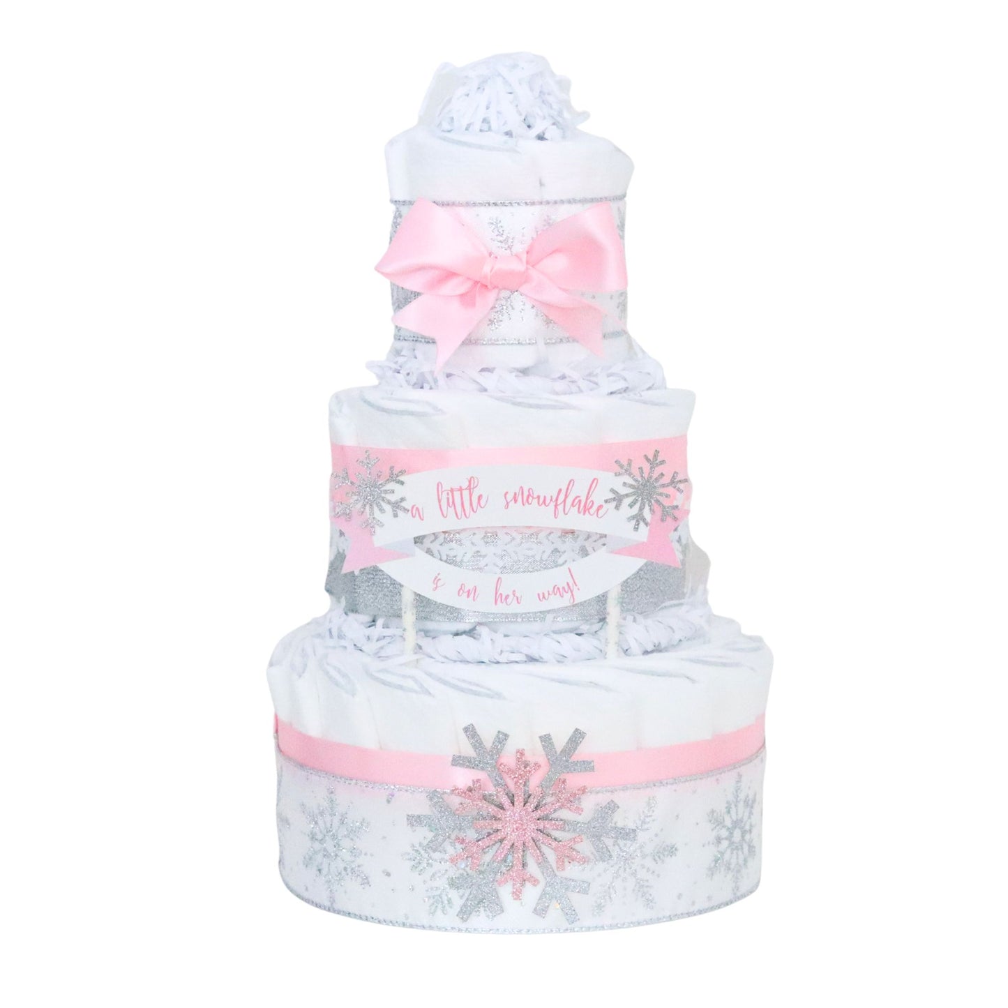 pink snowflake diaper cake on white background