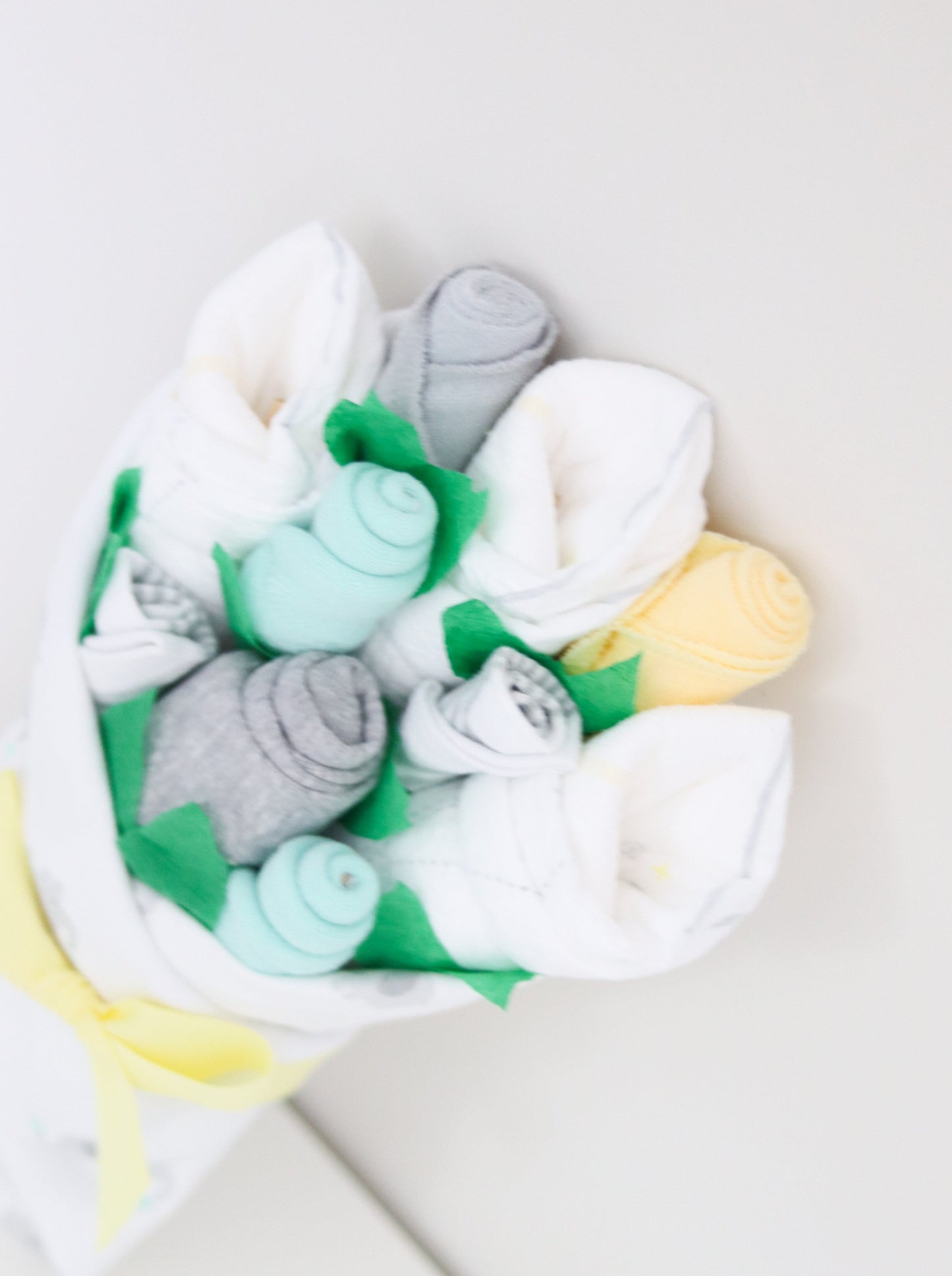neutral baby gift clothing bouquet
