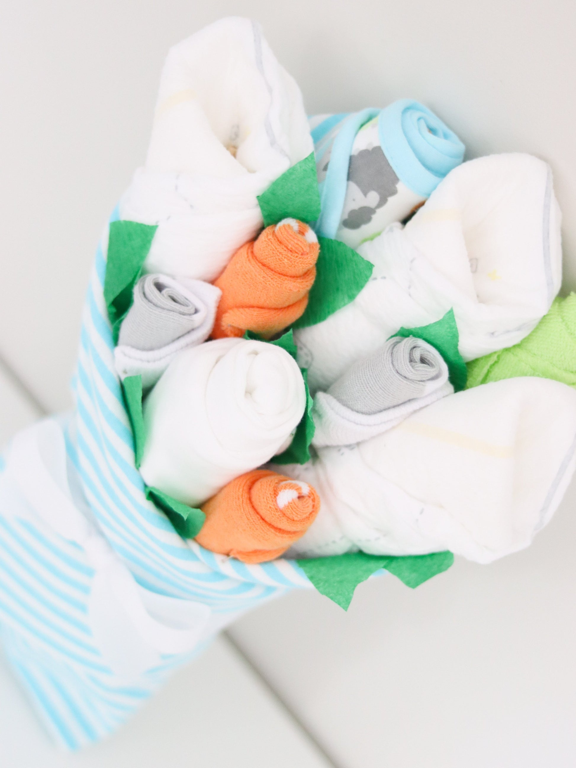 neutral baby gift clothing bouquet