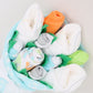 neutral baby clothes bouquet gift set