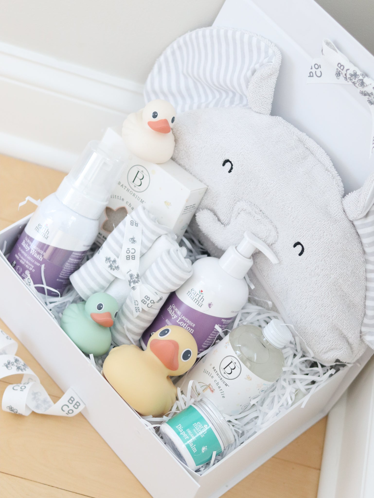 Baby bath care products set with ducks towels and washcloths in a box