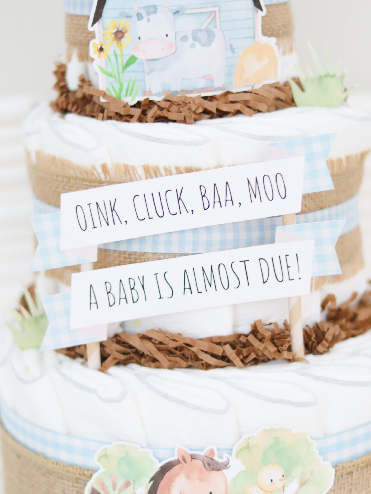 oink cluck baa moo a baby is almost due diaper cake sign