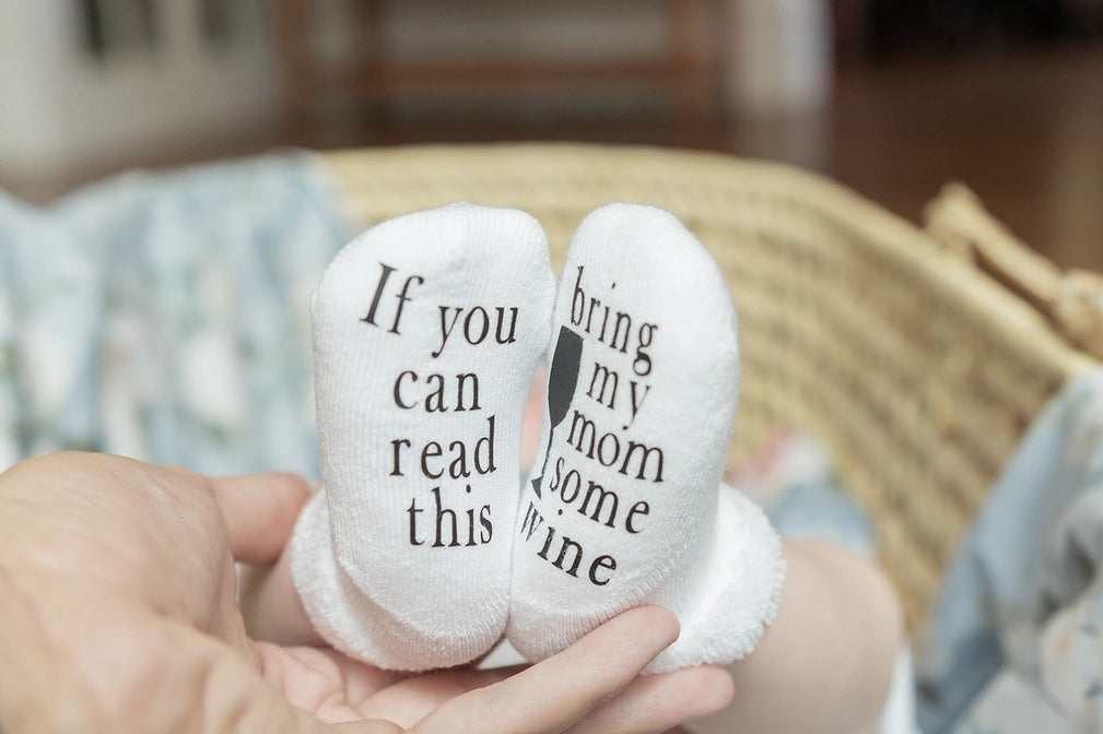 if you can read this bring my mom some wine baby socks