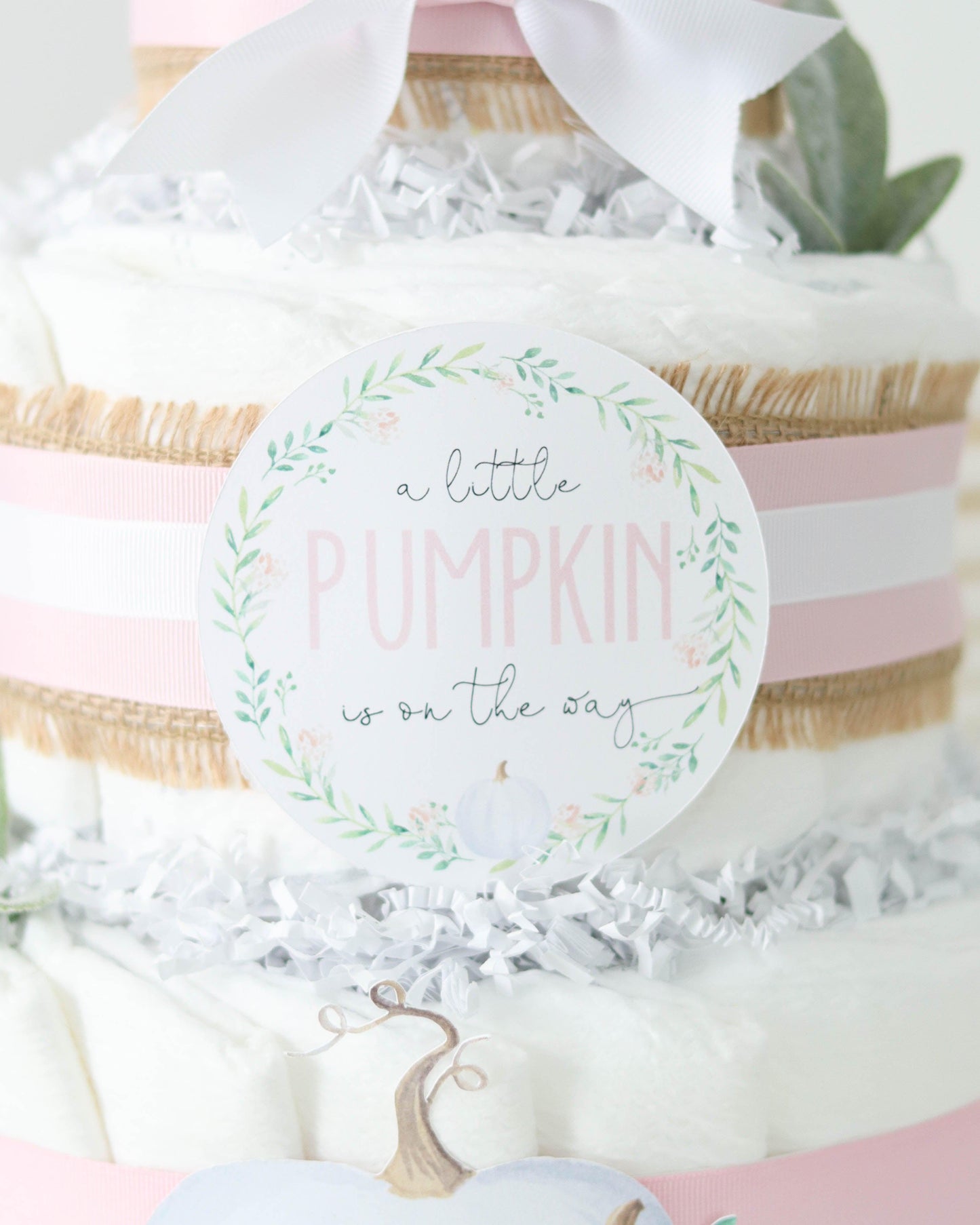 a little pumpkin is on the way diaper cake sign