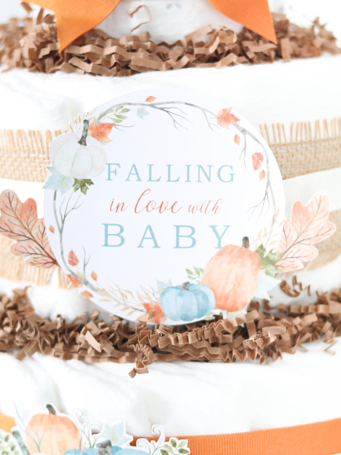 falling in love with baby diaper cake sign