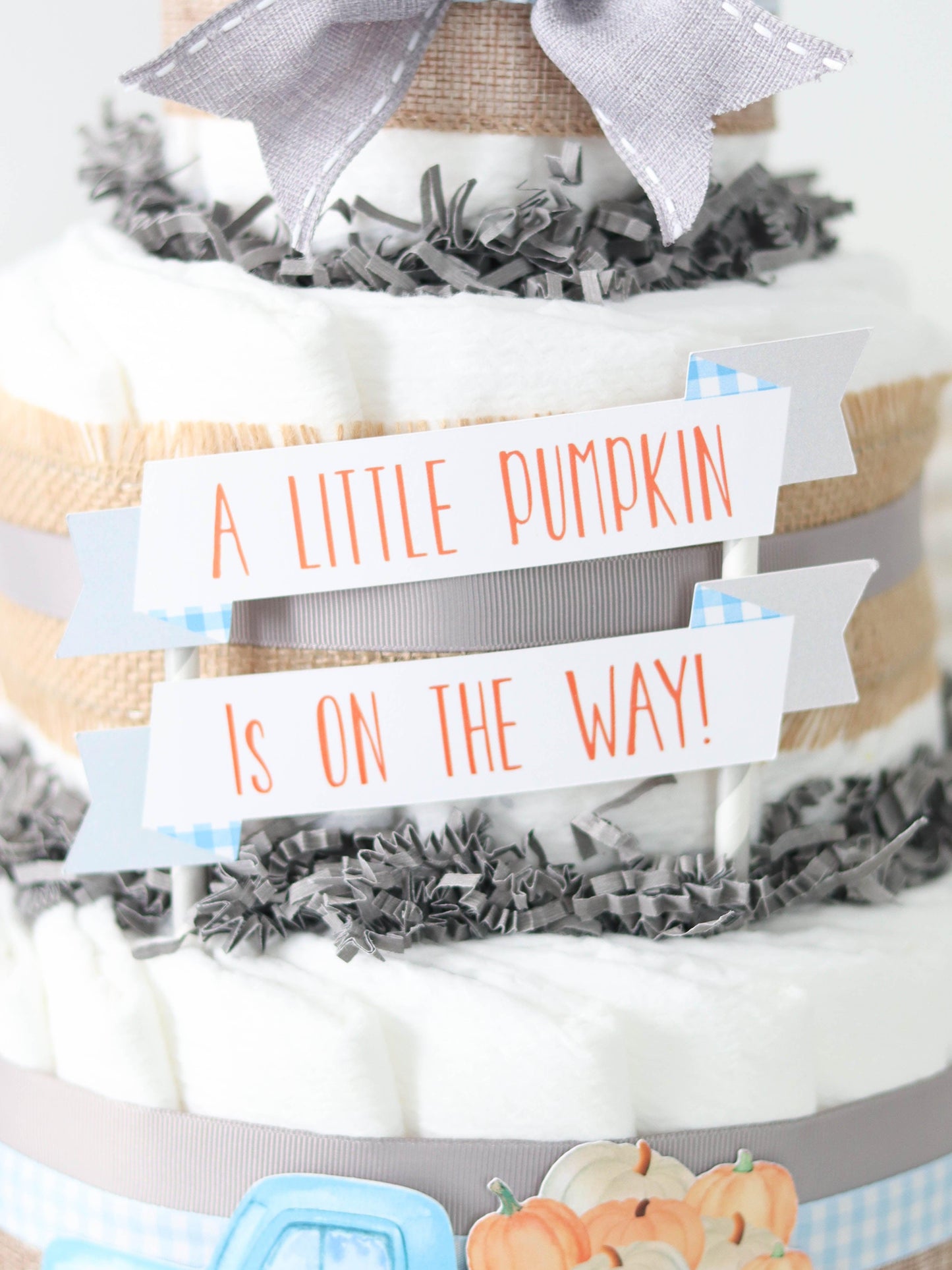 little pumpkin diaper cake sign