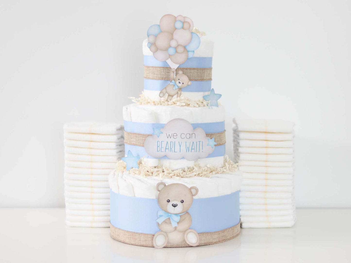 baby blue teddy bear diaper cake with balloons