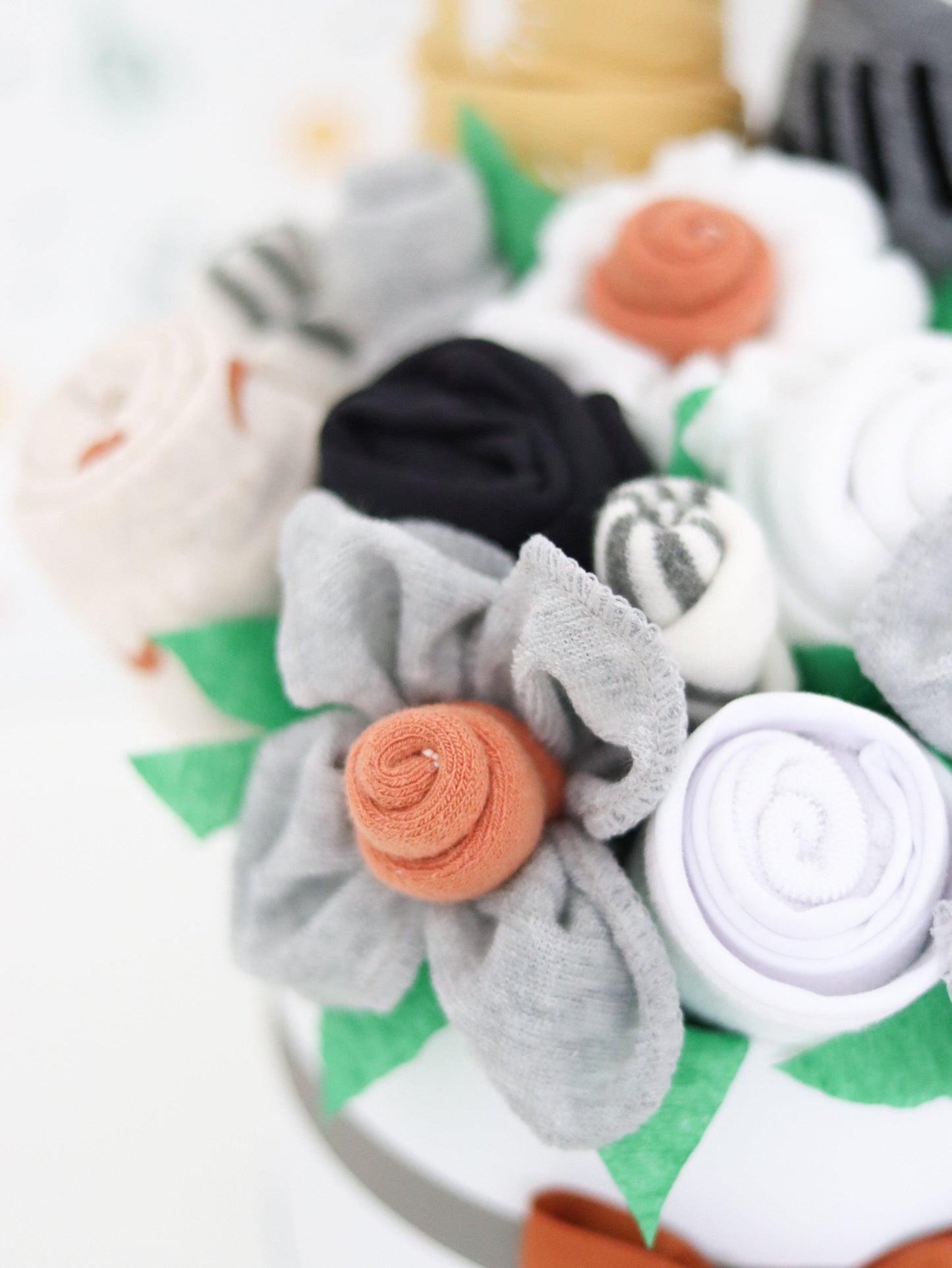 neutral baby gift washcloth flowers