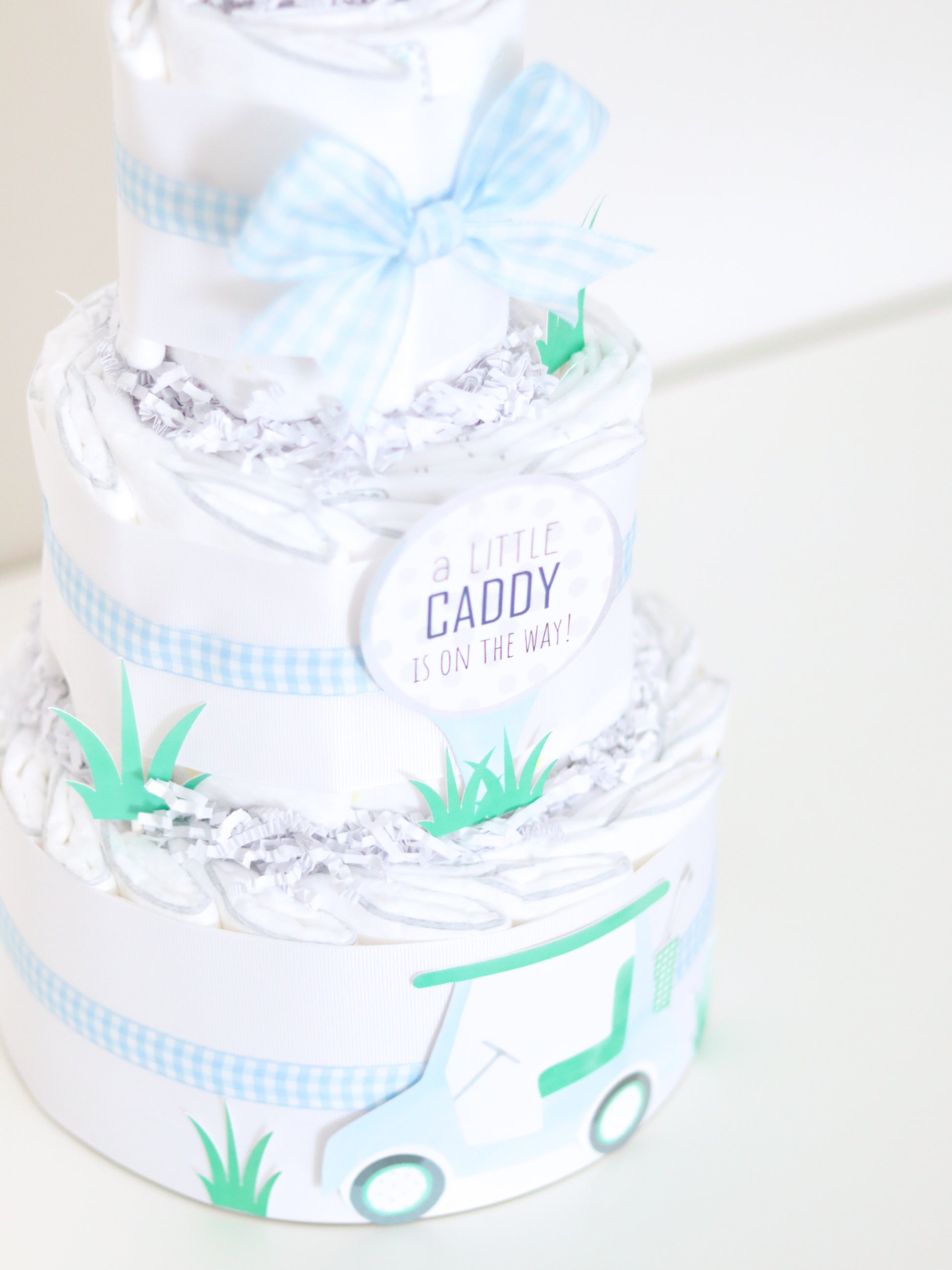 a little caddy is on the way baby shower cake