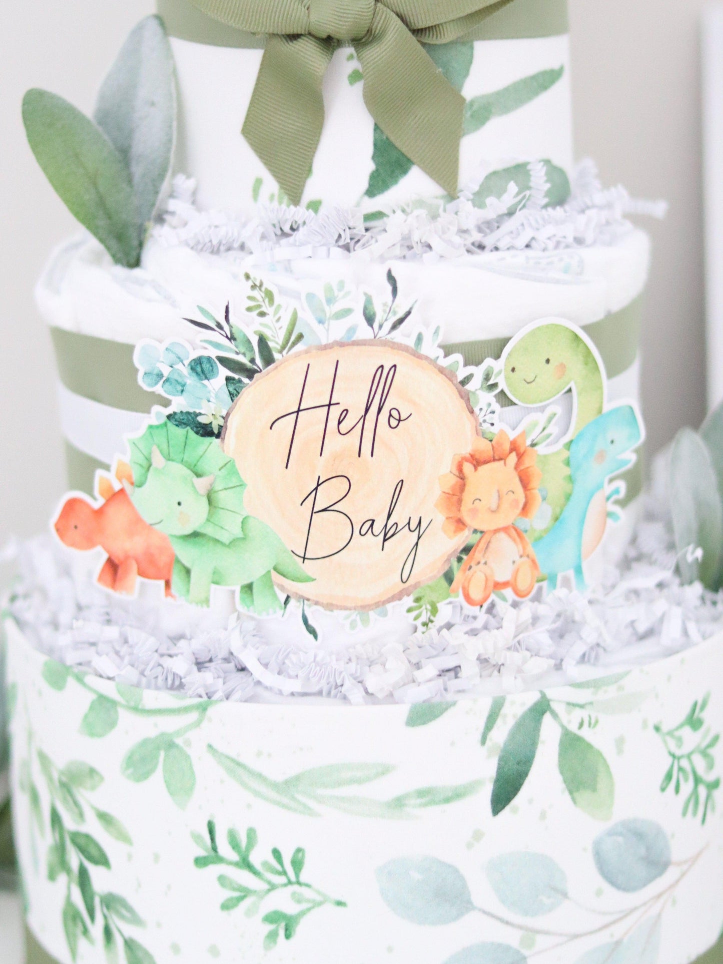 hello baby diaper cake sign with dinosaurs