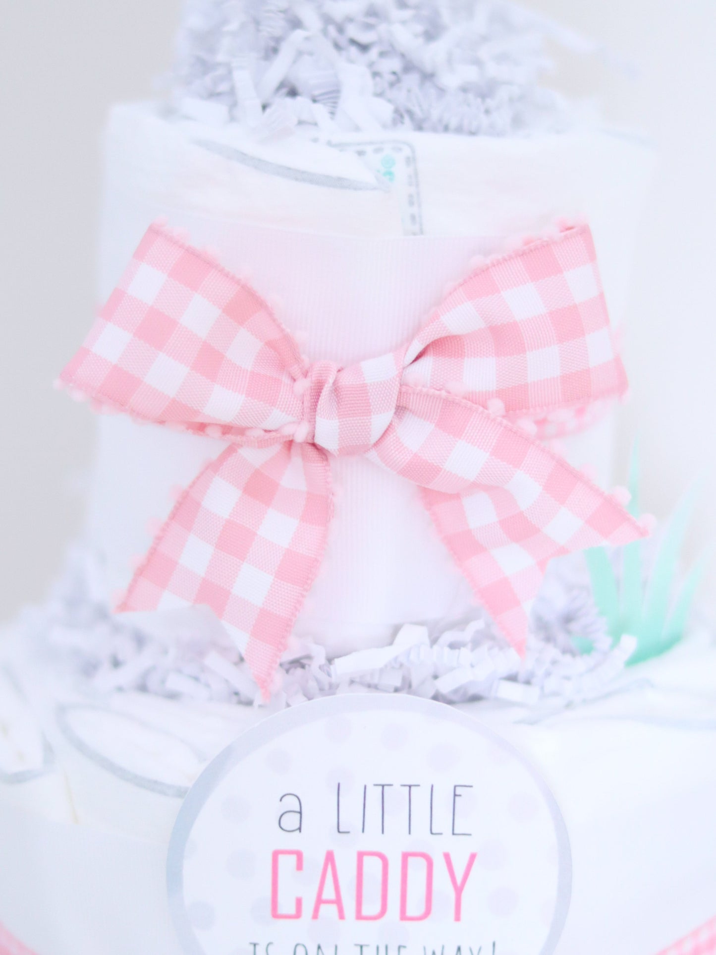 pink gingham bow golf diaper cake