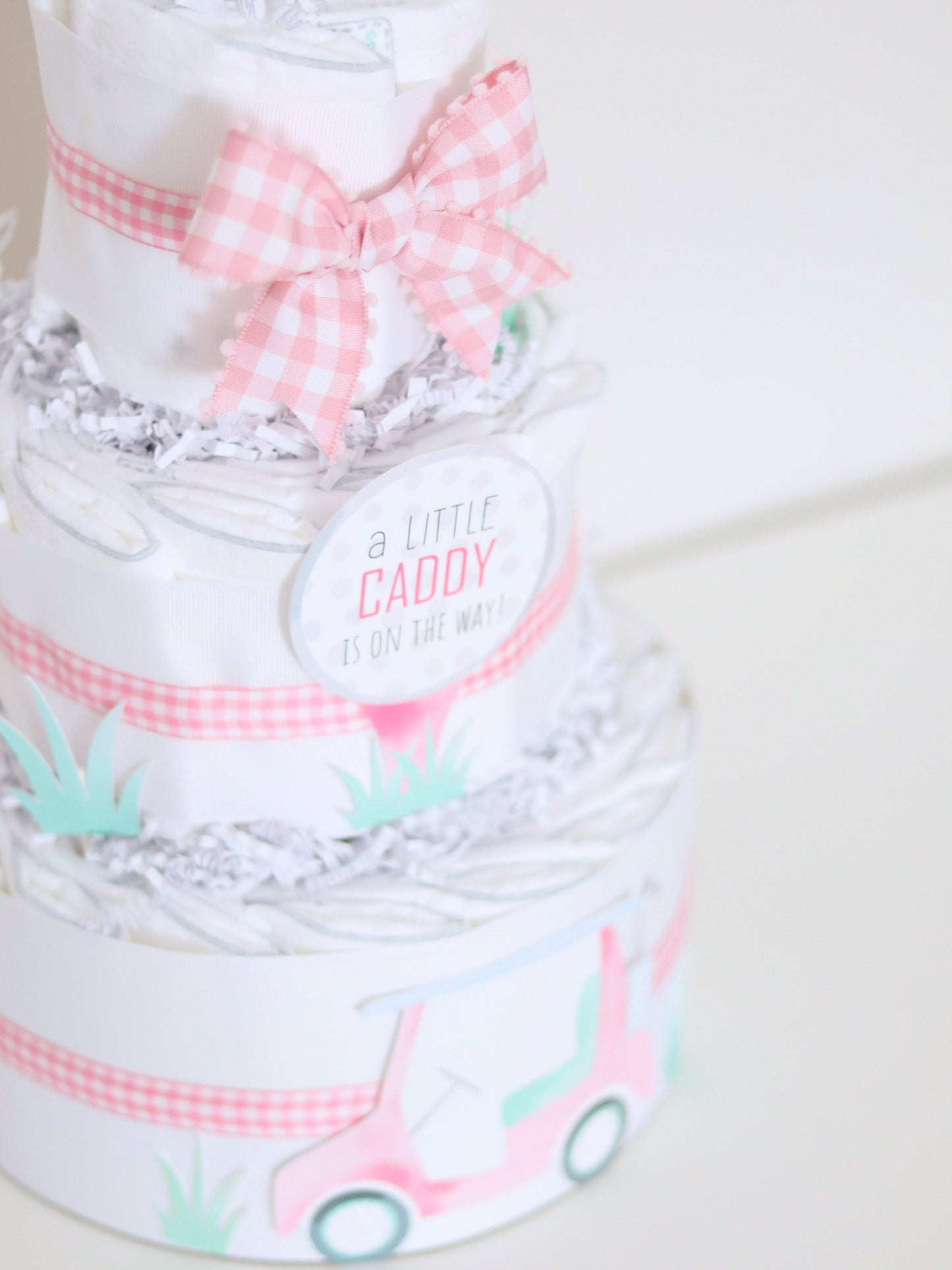 pink little caddy golf diaper cake
